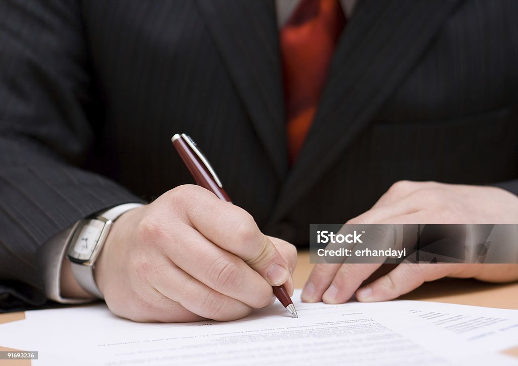 Signing the Contract  Adult Stock Photo