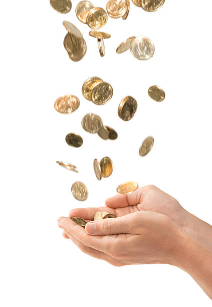 Male Cupped Hands Catching Falling Gold Coins Isolated on White