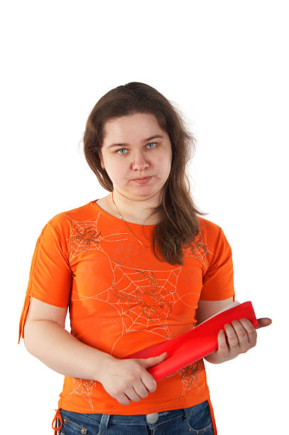 Girl with twisted red folder stock photo