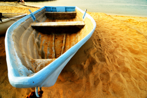 front view of a blue boat sitting on Dubai beach
