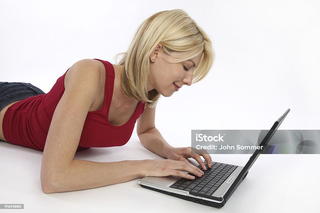 Girl typing on her laptop /file_thumbview_approve.php?size=1&id=8366425 20-29 Years Stock Photo