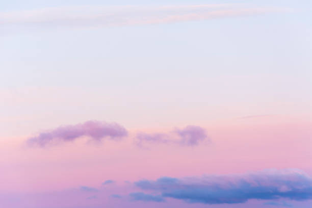 istock Sunrise sky with orange/purple clouds 916939962