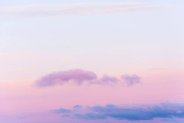 istock Sunrise sky with orange/purple clouds 916940980