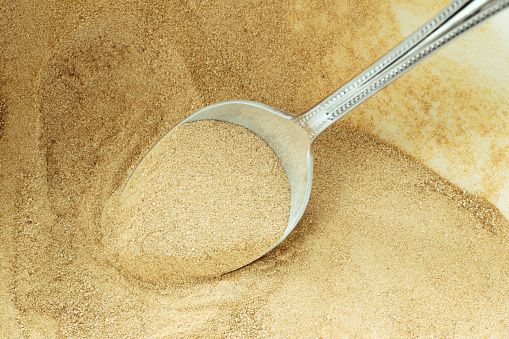Close-up of Brewer's Yeast in a bowl. This is the inactive form used as a nutritional supplement.