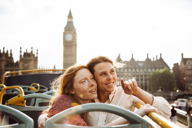 istock lesbian couple on the bus in london 916948694