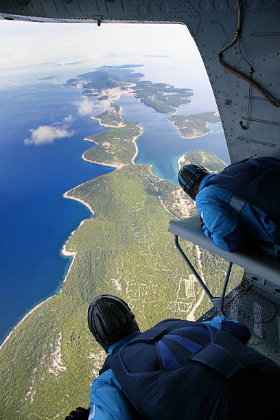 istock Parachuters before jump from the helicopter 91694873