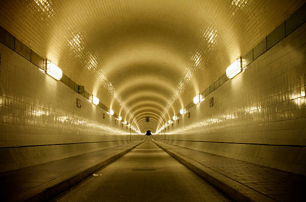 istock long dark tunnel in sepia 91695262