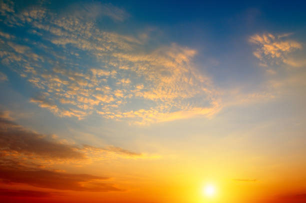 istock sky and bright sunrise over the horizon 916954682