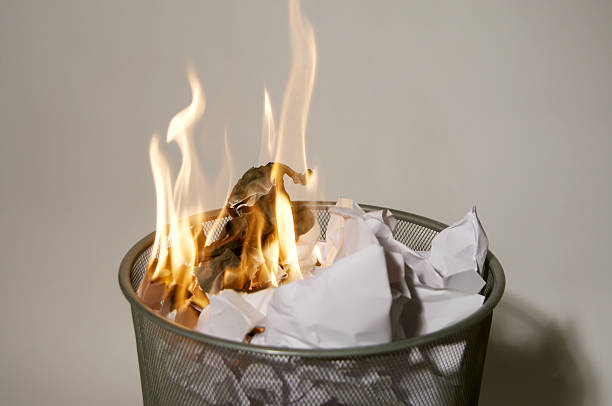 Fire in a wastepaper basket  wastepaper basket photos stock pictures, royalty-free photos & images