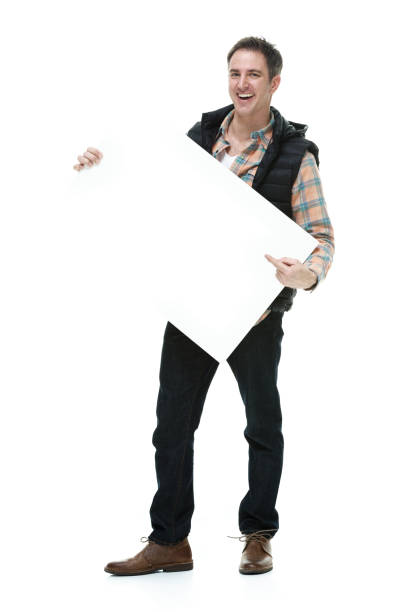 istock Man wearing casual warm clothes with placard 916955074