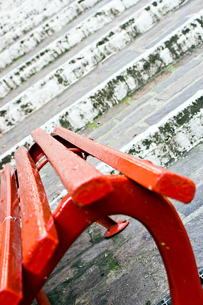 Red Seat And White Stairs stock photo