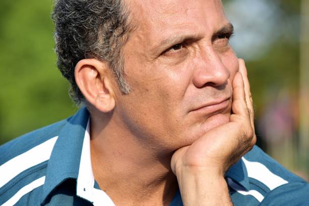 istock Thoughtful Adult Male 916956100