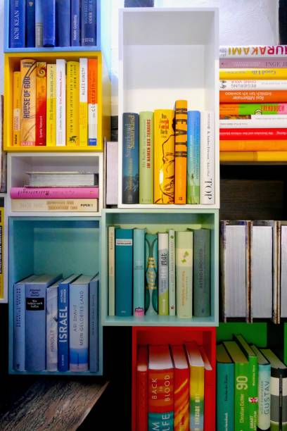 istock Colorful book shelves packed with books 916965872