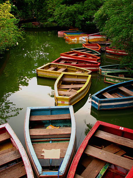 Empty Colored Wooden Boats stock photo