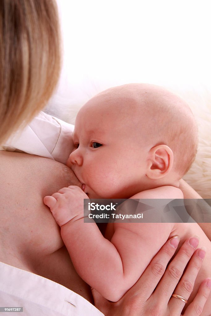 mother breast-feed her baby  Adult Stock Photo