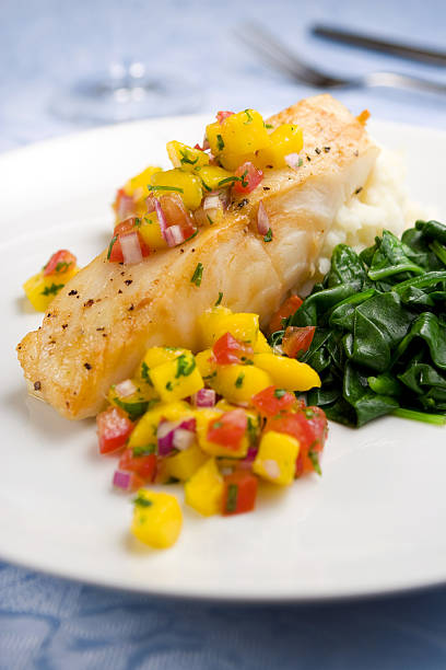 istock Sea bass with mango salsa 91697388