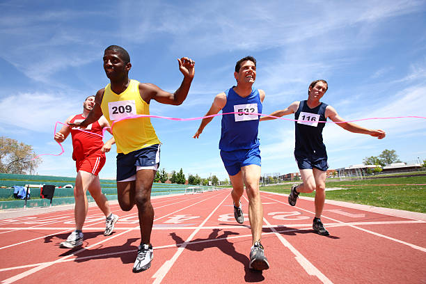 istock Runners excited to cross the finish line  91697527