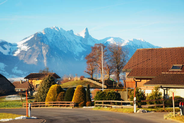 Road in Sigrilwil village at Swiss Alps and Thun lake Road in Sigrilwil village at Swiss Alps with Thun lake, Switzerland in winter thun interlaken winter switzerland stock pictures, royalty-free photos & images