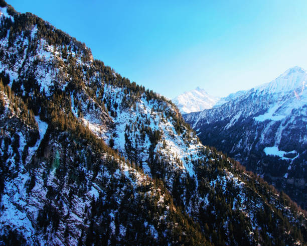 Mountain peaks ridge winter Swiss Alps Mountain peaks ridge, winter Swiss Alps helicopter view thun interlaken winter switzerland stock pictures, royalty-free photos & images