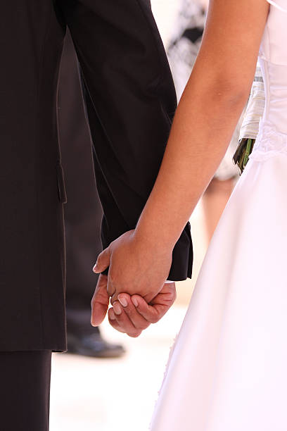 istock Couple of heterosexual holds hands 91697722