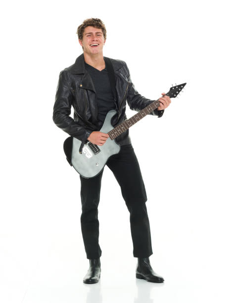 istock Attractive man playing electric guitar 916985500