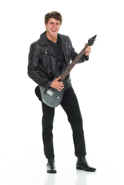 istock Attractive man playing electric guitar 916985502
