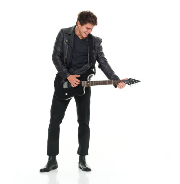 Close up man playing electric guitar