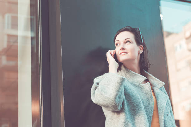 istock Making a phone call in the city. 916985574