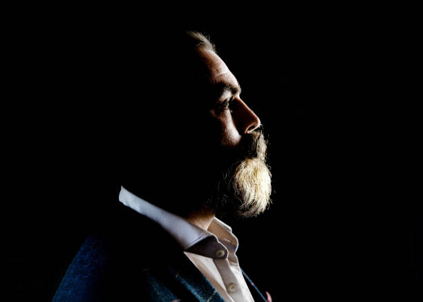 istock Smart Man with beard and moustache wearing suit 916986248