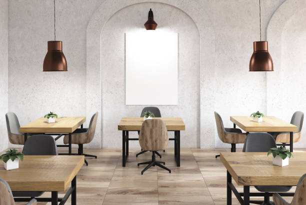 istock Concrete cafe, wooden tables, poster 916986588