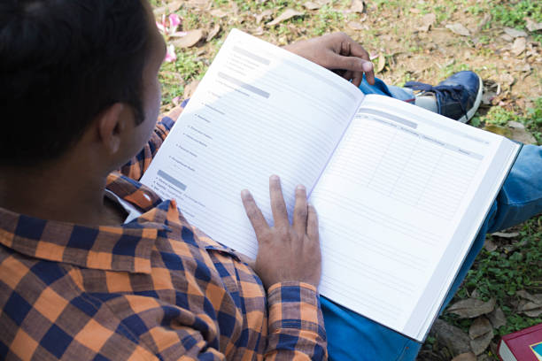 istock College boy in park 916989744