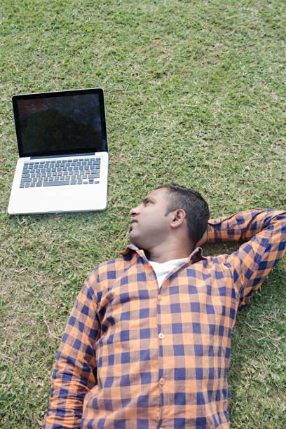 istock College boy in park 916989956