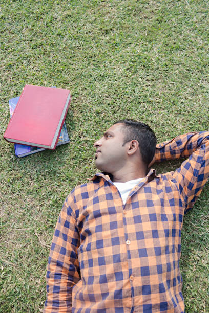 istock College boy in park 916989958