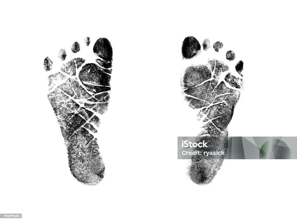 Newborn Infant Baby Footprint Ink Stamp Impressions Isolated Authentic Inked stamped impressions of a newborns' feet isolated on a 100% white background. Photographed with a Canon 5D. Baby - Human Age Stock Photo