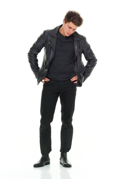 istock Attractive man in black standing is disappointed 916995628