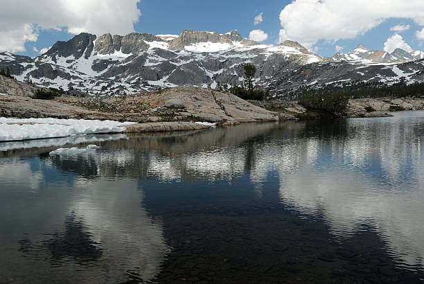 istock Clouds over alpine lake in California mountains 91699646