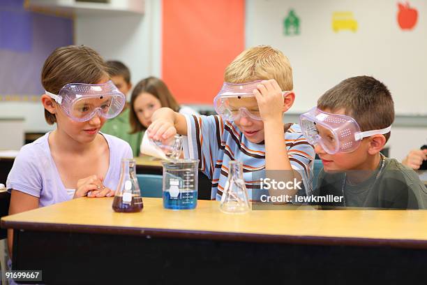 Elementary School Students Doing A Science Experiment Stock Photo - Download Image Now