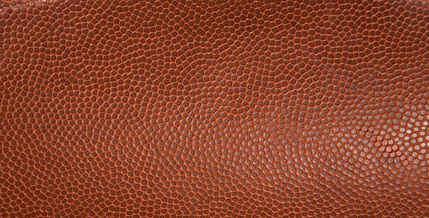 istock The texture from an American football  91699879