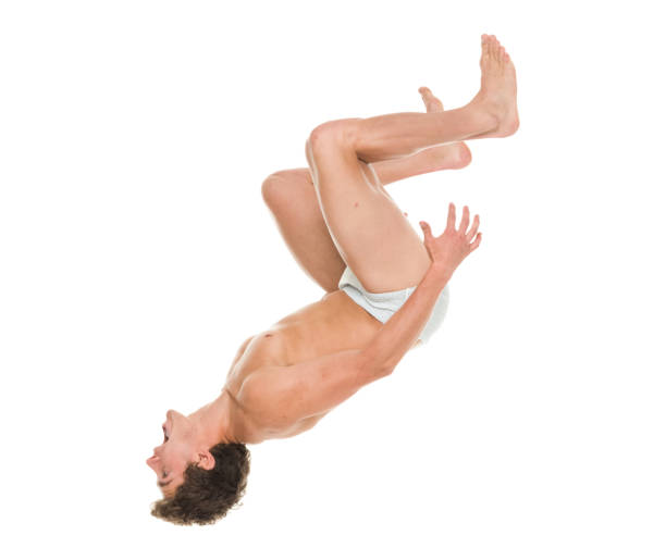 istock Man in adult diapers doing back flips 917000636