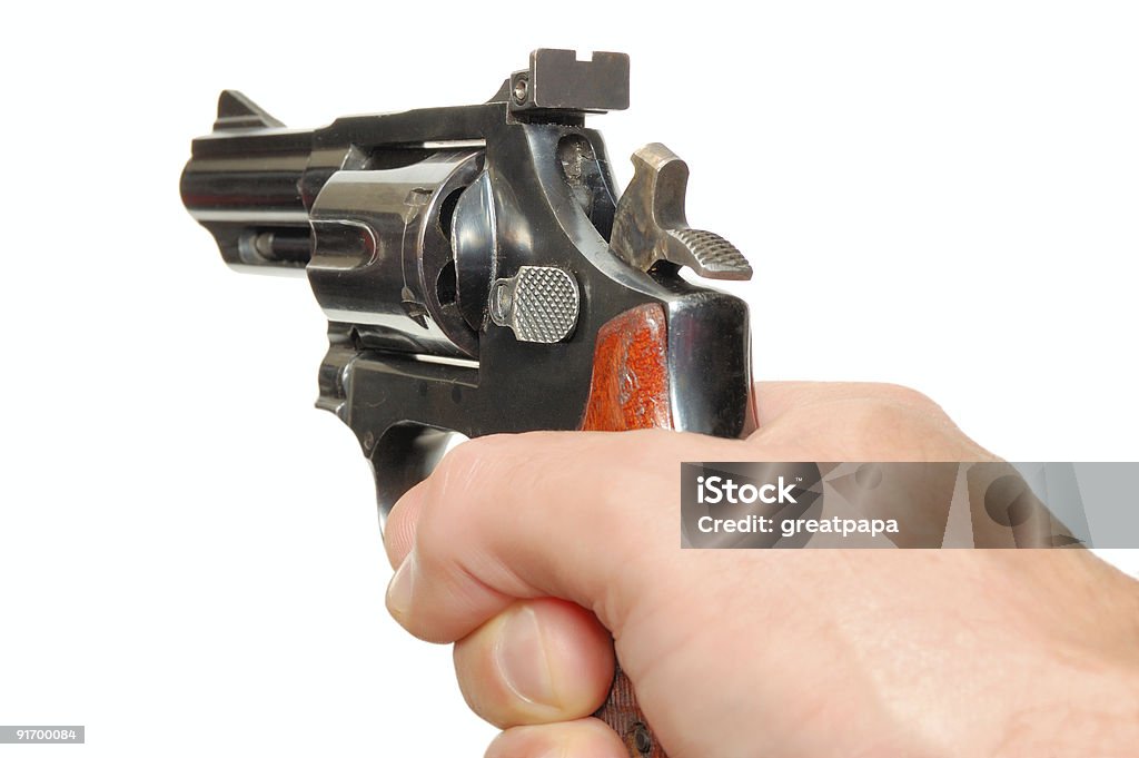 Hand with gun Hand with gun isolated over a white background Aiming Stock Photo