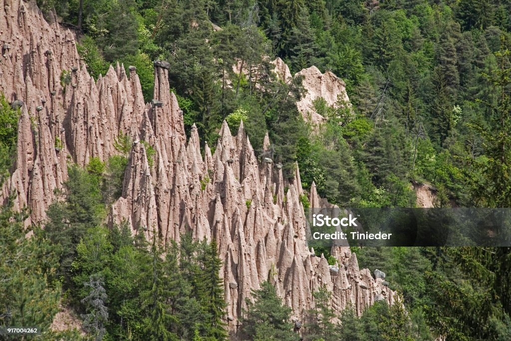 earth pyramids on the Ritten in South Tyrol The famous earth pyramids on the Ritten in South Tyrol consist of conical heaped clay and the boulders lying on it Dirt Stock Photo
