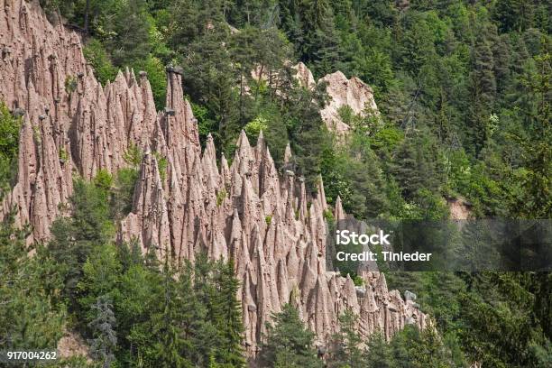 Earth Pyramids On The Ritten In South Tyrol Stock Photo - Download Image Now - Dirt, Pyramid Shape, Eroded