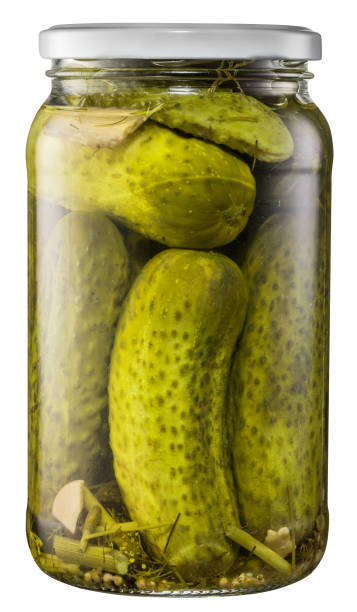 istock Pickled cucumbers in the glass can. 917004854