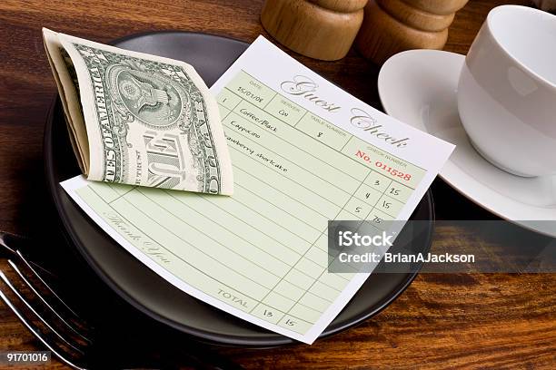 Restaurant Guest Check With Folded Dollar Bills Stock Photo - Download Image Now - Gratuity, Financial Bill, Paper Currency