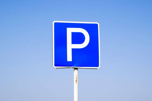 istock Road sign parking. Sign on a blue sky background. 917014286