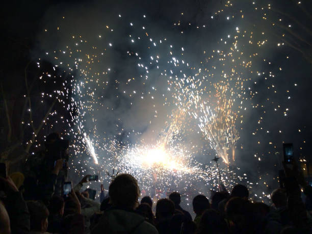 Fireworks. Festival Spain Fireworks. Popular parties, correfoc Barcelona.Many people disguise themselves as demons and go out in the streets throwing firecrackers and fireworks fete stock pictures, royalty-free photos & images