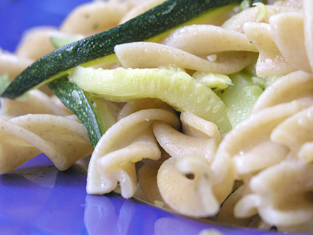 Integral pasta with zucchinis stock photo