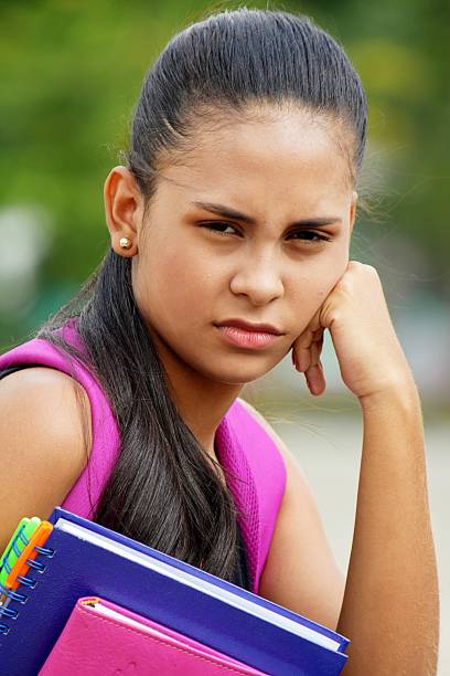 istock Unhappy Teen Female Student 917021042