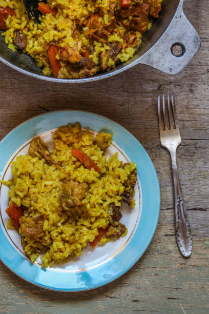 istock pilaf - rice with meat and spices 917031304