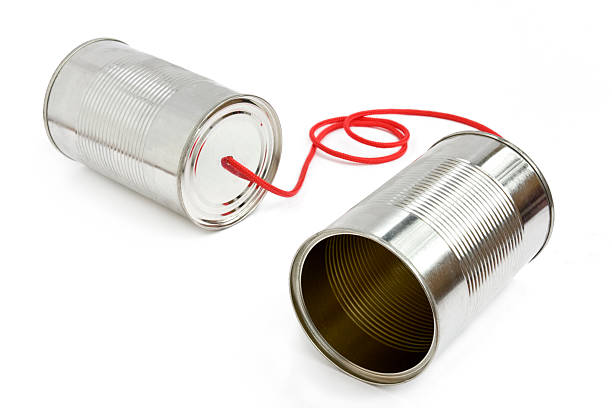 телефон из консервных банок - telephone can communication tin can phone стоковые фото и изображения